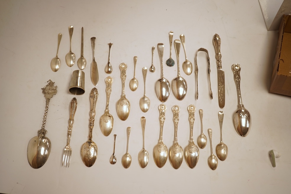 A small quantity of assorted mainly 19th century and later small flatware including teaspoons, coffee spoons and condiment spoons, various dates and makers, a Dutch? white metal spoon and a Victorian silver christening t